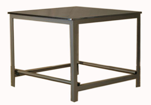 A photograph of a large, square steel table